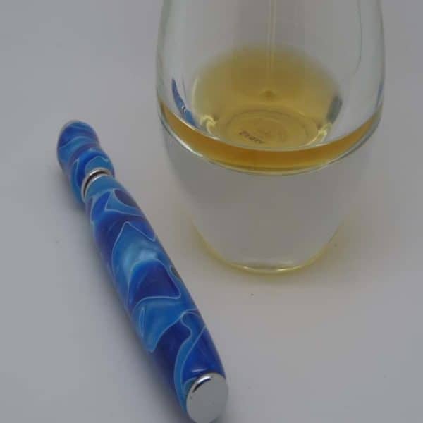 Blue Applicator Pen And Perfume Bottle