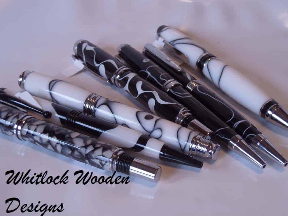 Rollerballs With Black And White Ballpoint Pens