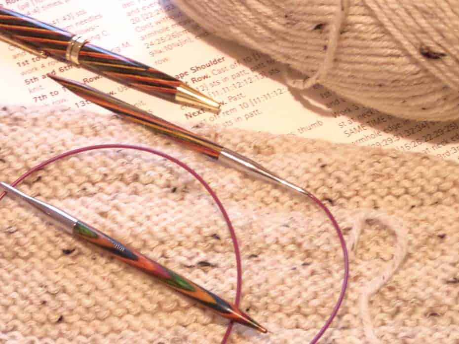 Multi coloured European pen with knitting needles